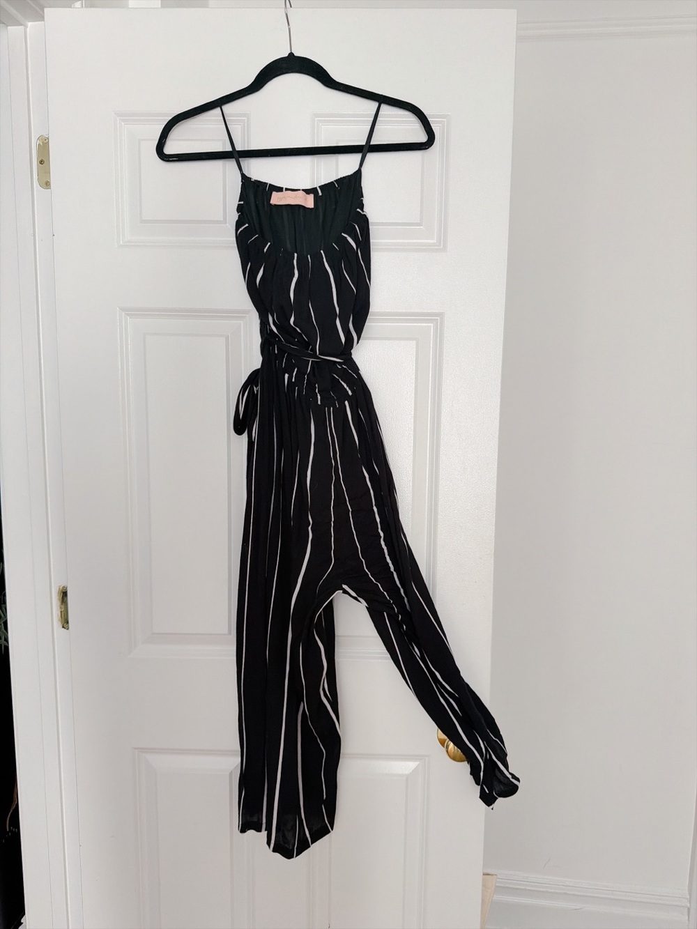 Black and White Striped Sleeveless Jumpsuit with Tie Waist